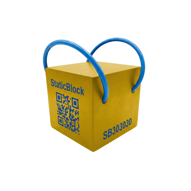Żółty blok podporowy z kodem QR i niebieskimi uchwytami, wymiary 30x30x30 cm.
